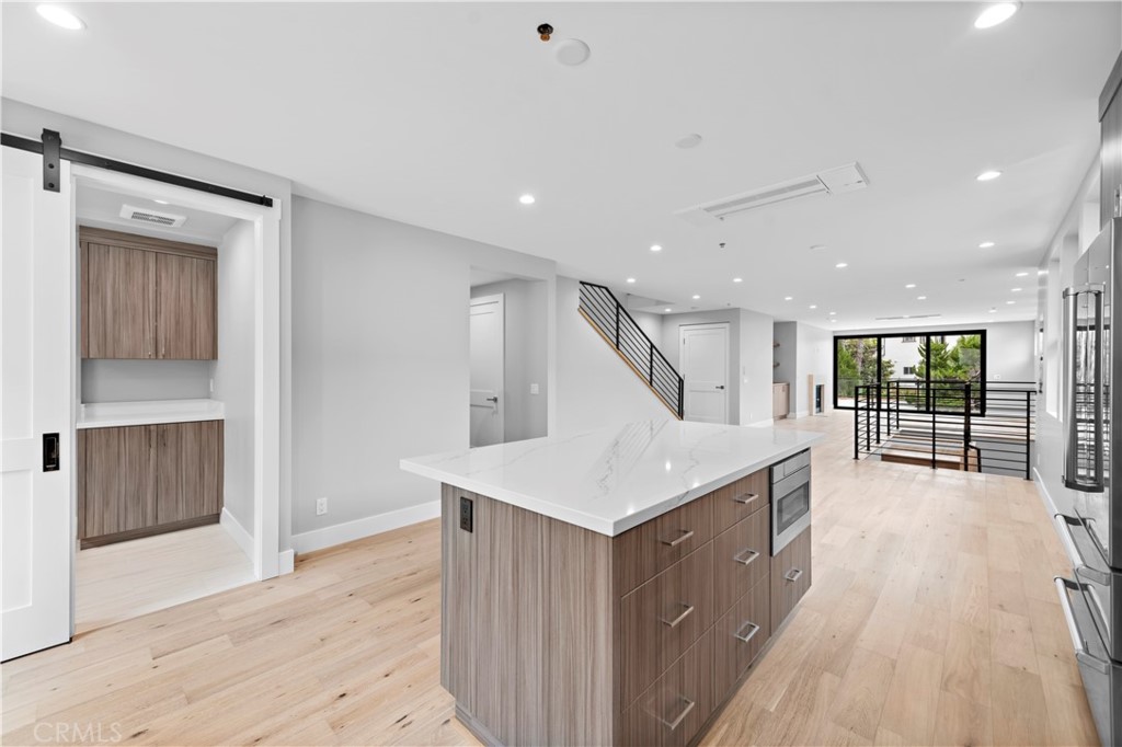 33903 Robles Drive Dana Point, CA 92629 - Photo 18 of 58 a view of an entryway with wooden floor