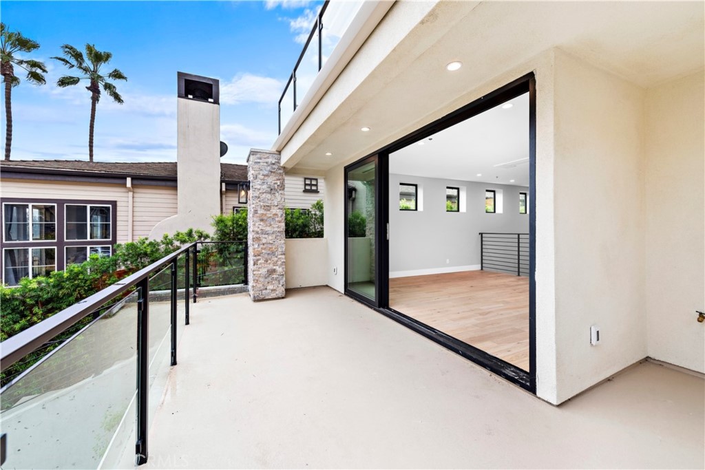 33903 Robles Drive Dana Point, CA 92629 - Photo 23 of 58 a view of a hallway with a potted plant