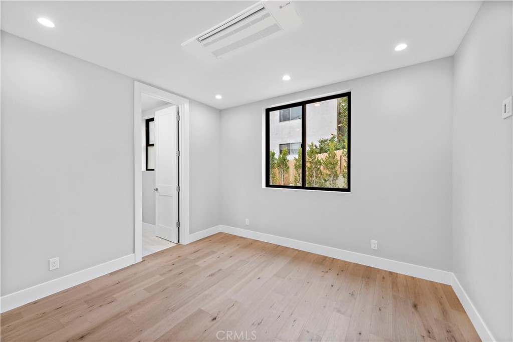 33903 Robles Drive Dana Point, CA 92629 - Photo 29 of 58 wooden floor in an empty room with a window