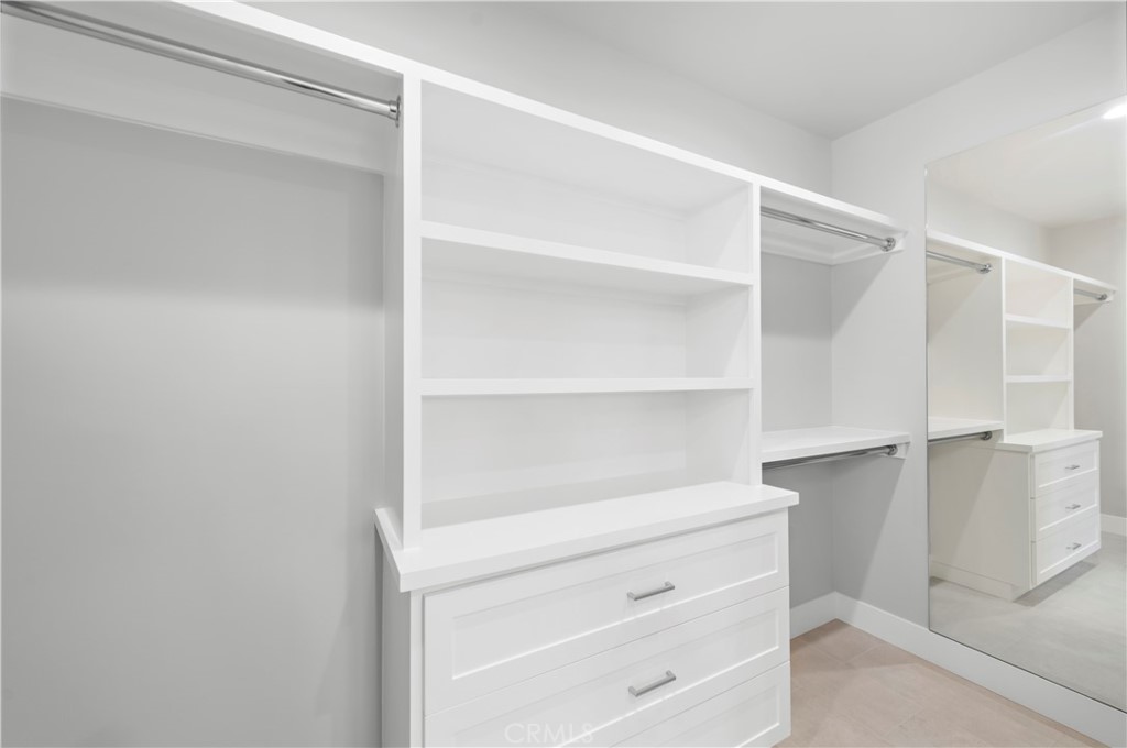 33903 Robles Drive Dana Point, CA 92629 - Photo 39 of 58 a view of walk in closet with empty racks