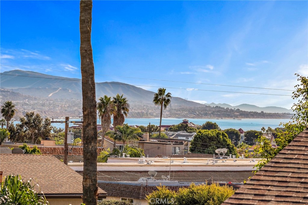 33903 Robles Drive Dana Point, CA 92629 - Photo 48 of 58 a view of a lake with a mountain in the background