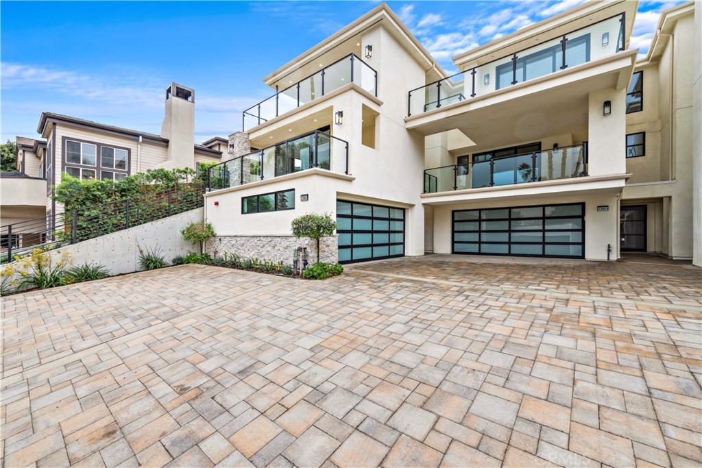 33903 Robles Drive Dana Point, CA 92629 - Photo 53 of 58 a front view of a house with a yard