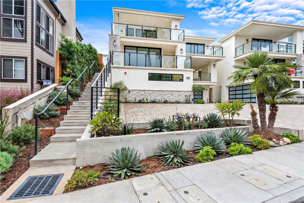 33903 Robles Drive Dana Point, CA 92629 - Photo 54 of 58 a front view of a multi story residential apartment building