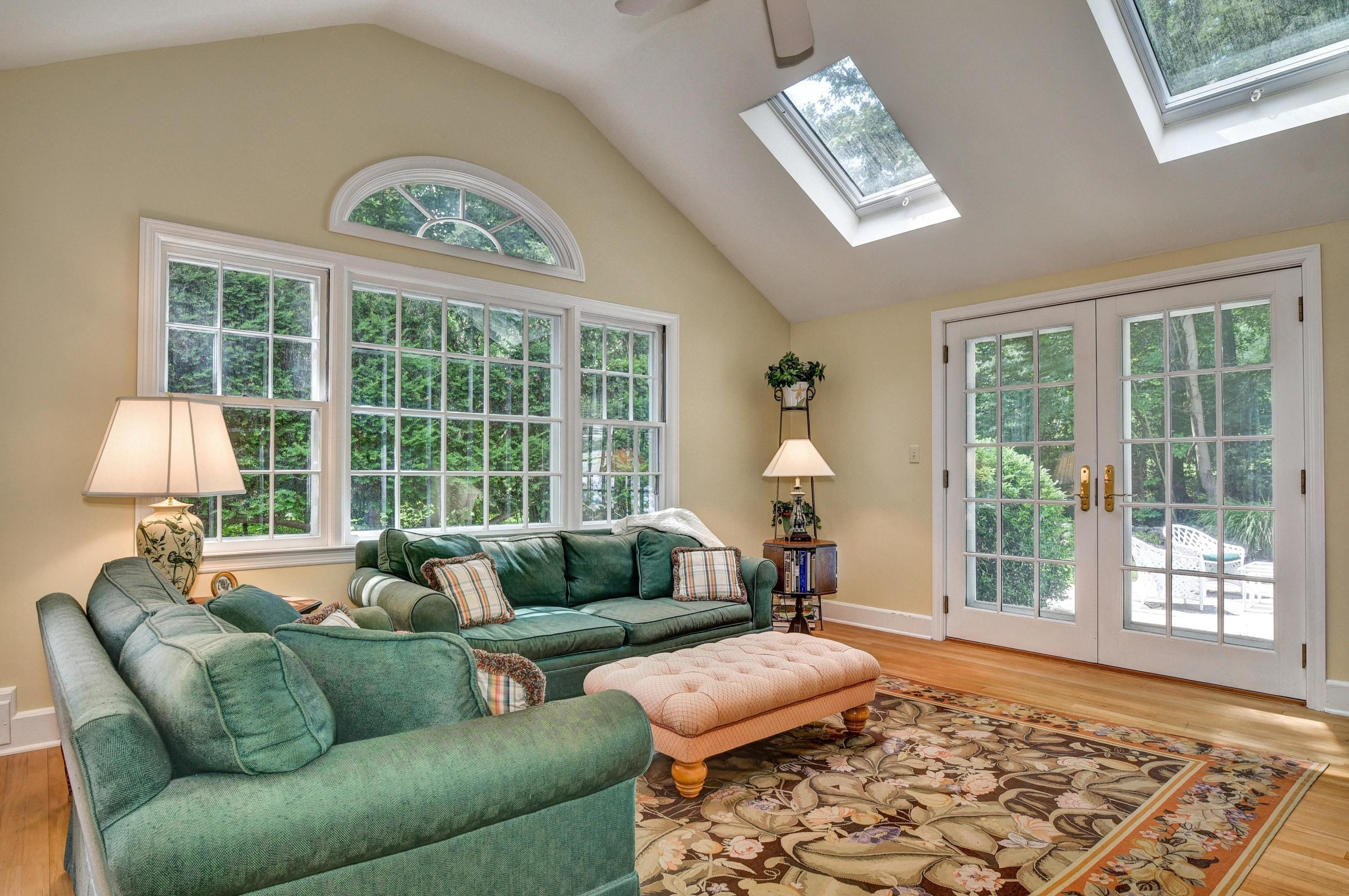 15 Sylvan Road Darien, CT 06820 - Photo 4 of 18 a living room with furniture and a large window