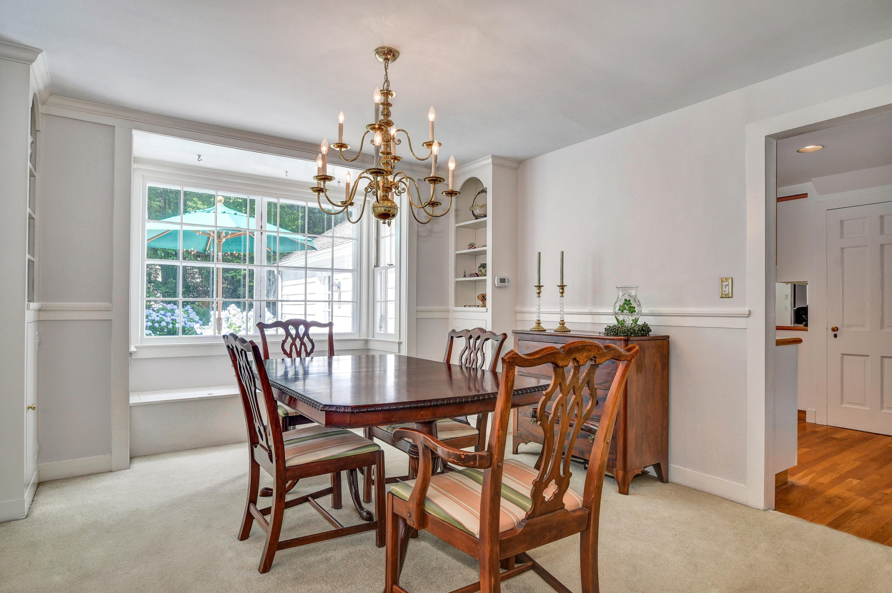 15 Sylvan Road Darien, CT 06820 - Photo 5 of 18 a view of a dining room with furniture window and outside view