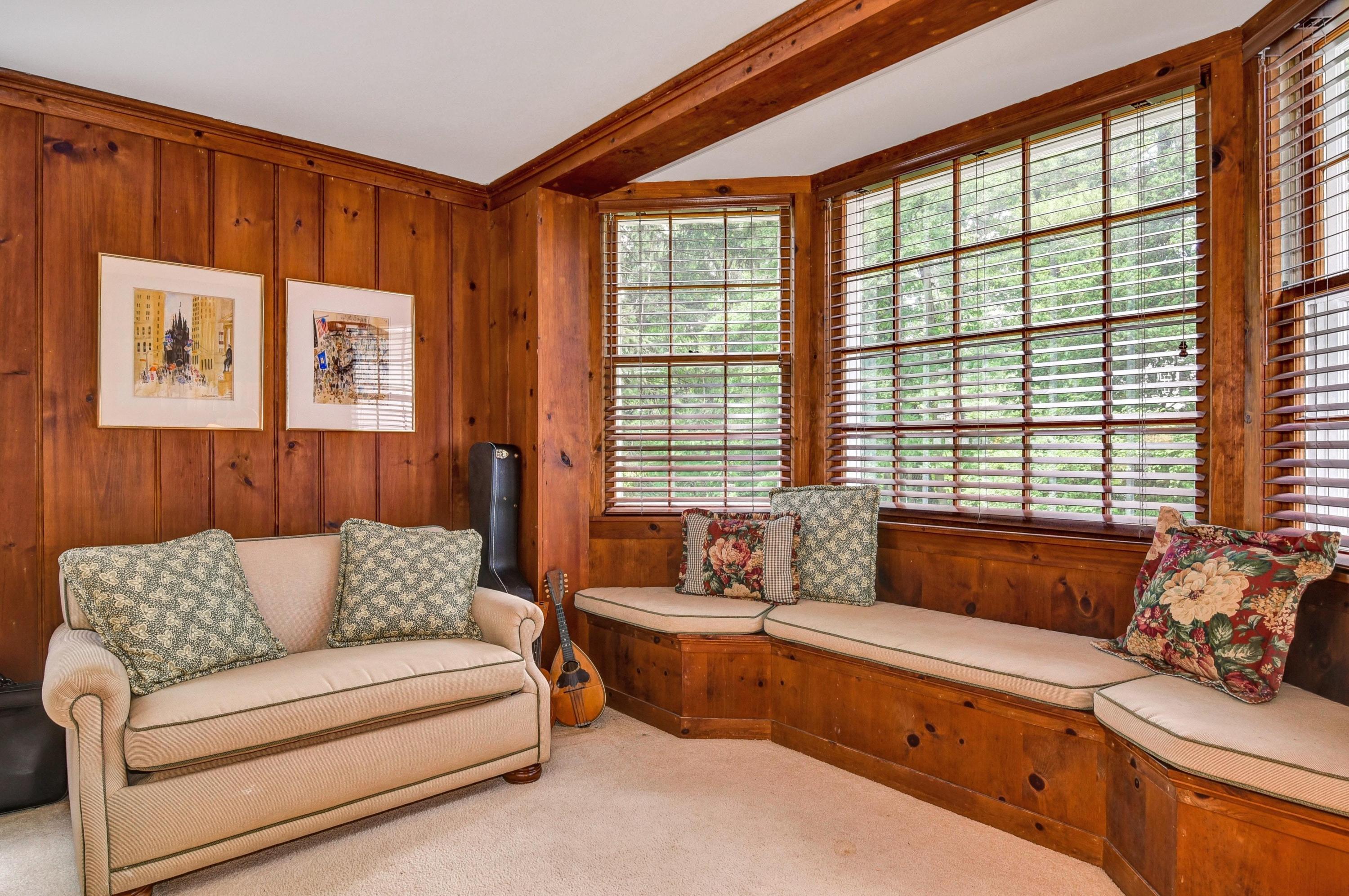 15 Sylvan Road Darien, CT 06820 - Photo 6 of 18 a living room with furniture and a large window