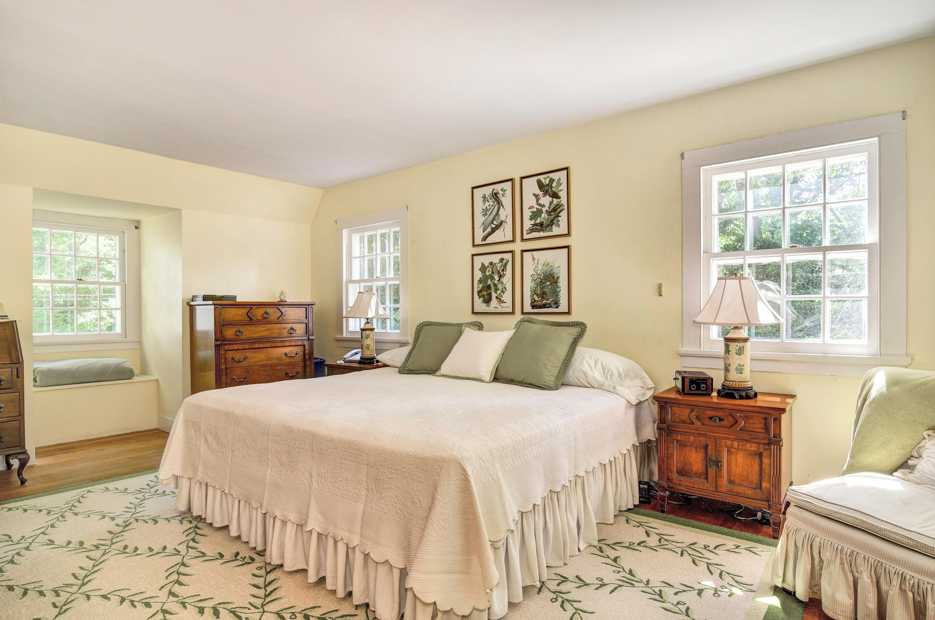 15 Sylvan Road Darien, CT 06820 - Photo 10 of 18 a bedroom with a bed and wooden floor
