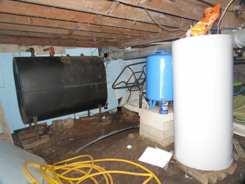 91 Coffee Pond Road Casco, ME 04015 - Photo 27 of 35 The crawl space has the oil barrel,...