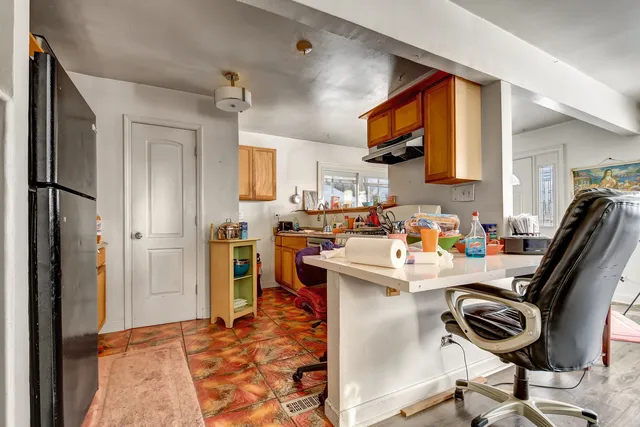 a view of a kitchen cabinets and a sink