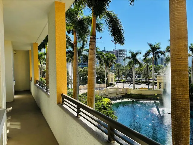 a view of swimming pool with outdoor seating