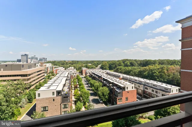 a view of a balcony with city view