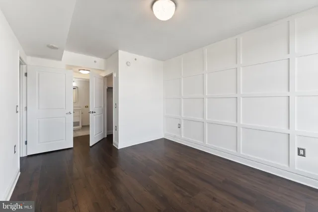 a view of a livingroom with wooden floor