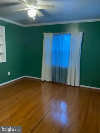a view of wooden floor and staircase