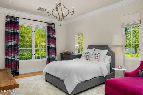 a view of patio with table and chairs under an umbrella