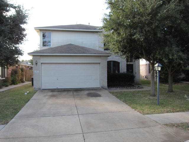 1425 Merchants Tale Lane Austin, TX 78748 - Photo 1 of 1 a front view of a house with garden