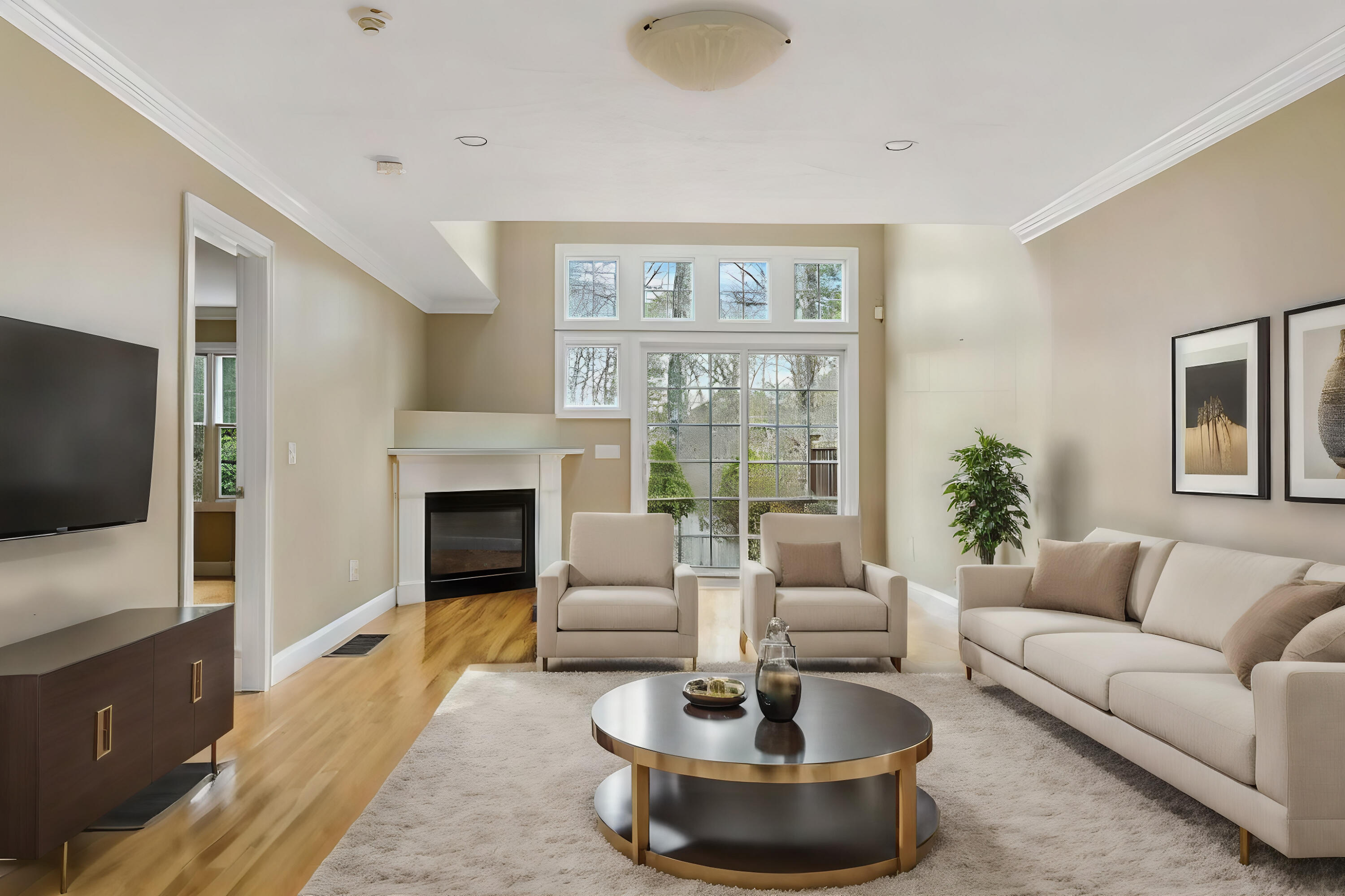 4 Gold Leaf Lane Mashpee, MA 02649 - Photo 13 of 33 a living room with furniture a fireplace and a flat screen tv