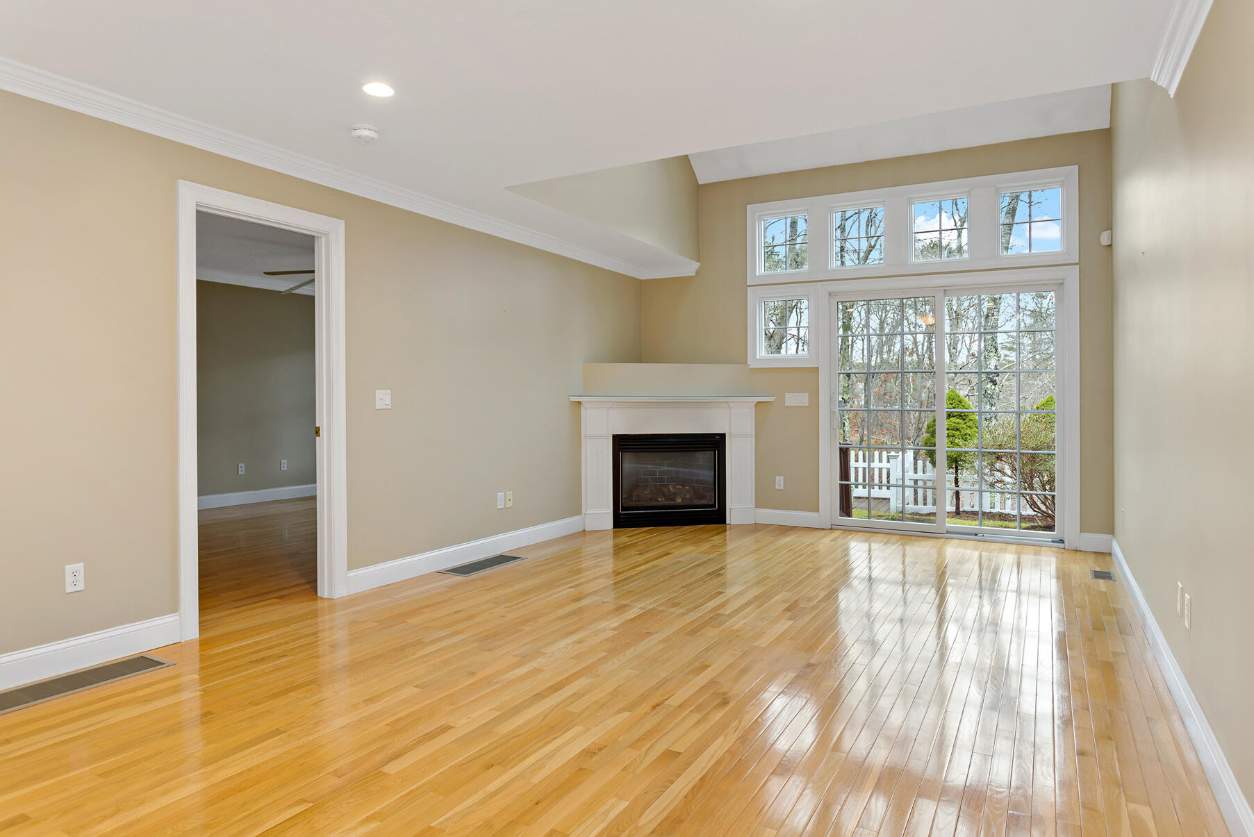 4 Gold Leaf Lane Mashpee, MA 02649 - Photo 16 of 33 a view of an empty room with wooden floor and a window