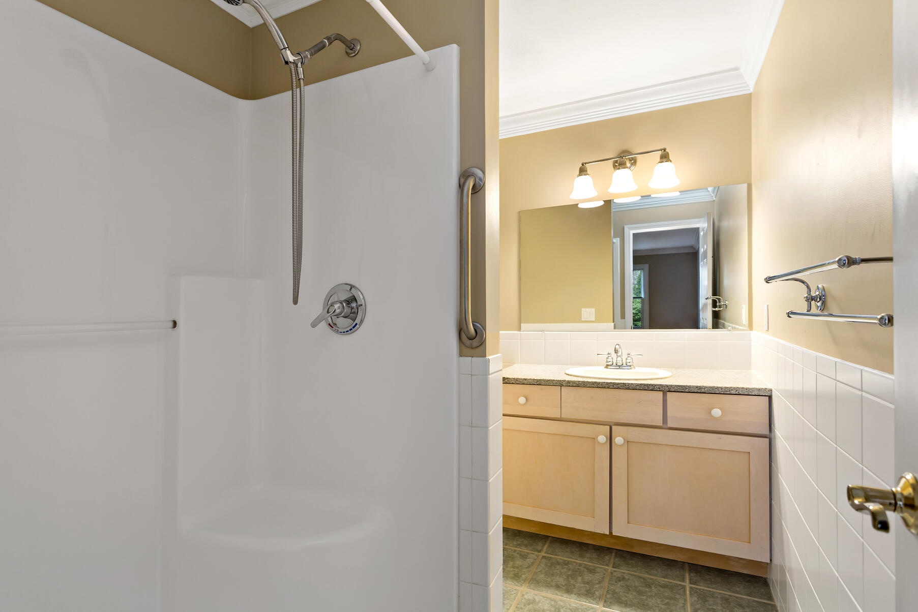 4 Gold Leaf Lane Mashpee, MA 02649 - Photo 20 of 33 a bathroom with a shower sink and mirror