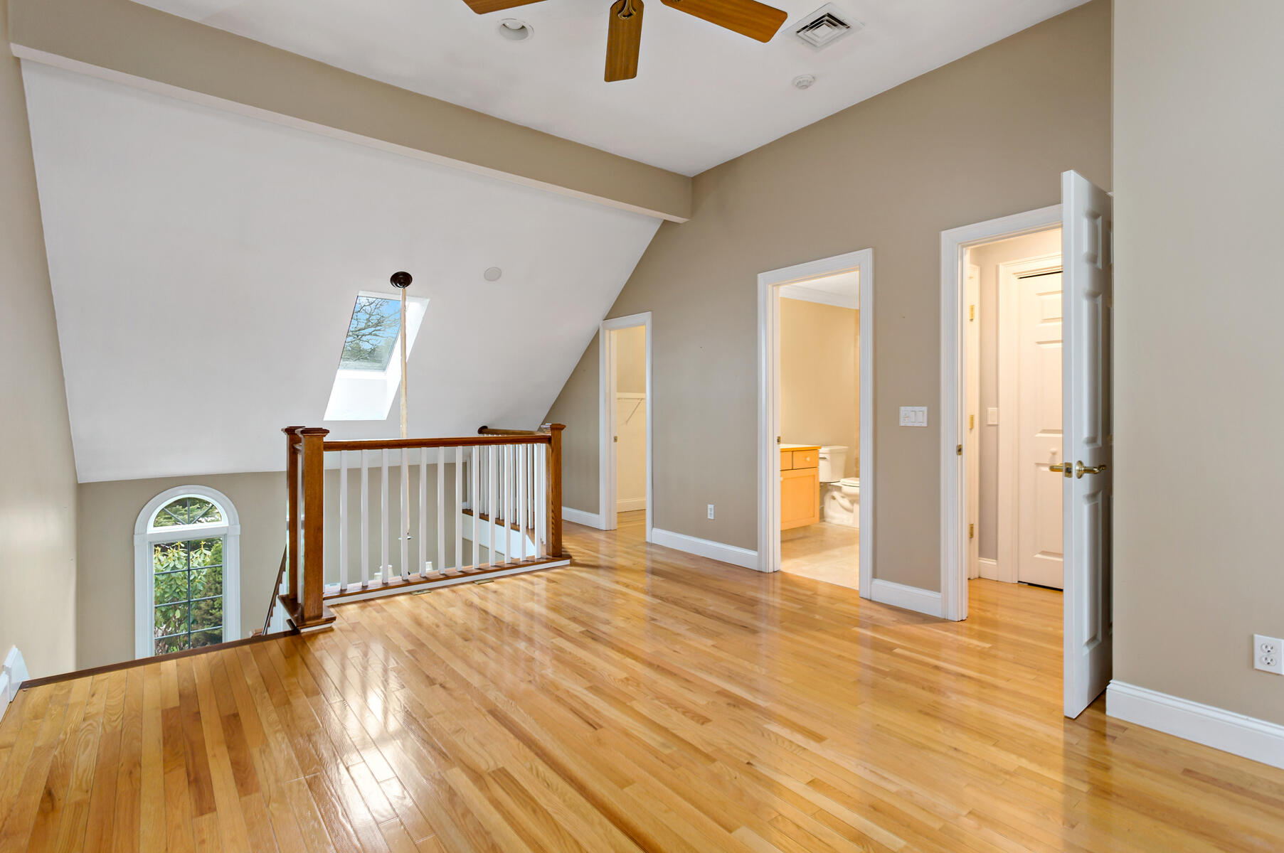 4 Gold Leaf Lane Mashpee, MA 02649 - Photo 22 of 33 a view of a hallway view with wooden floor and staircase