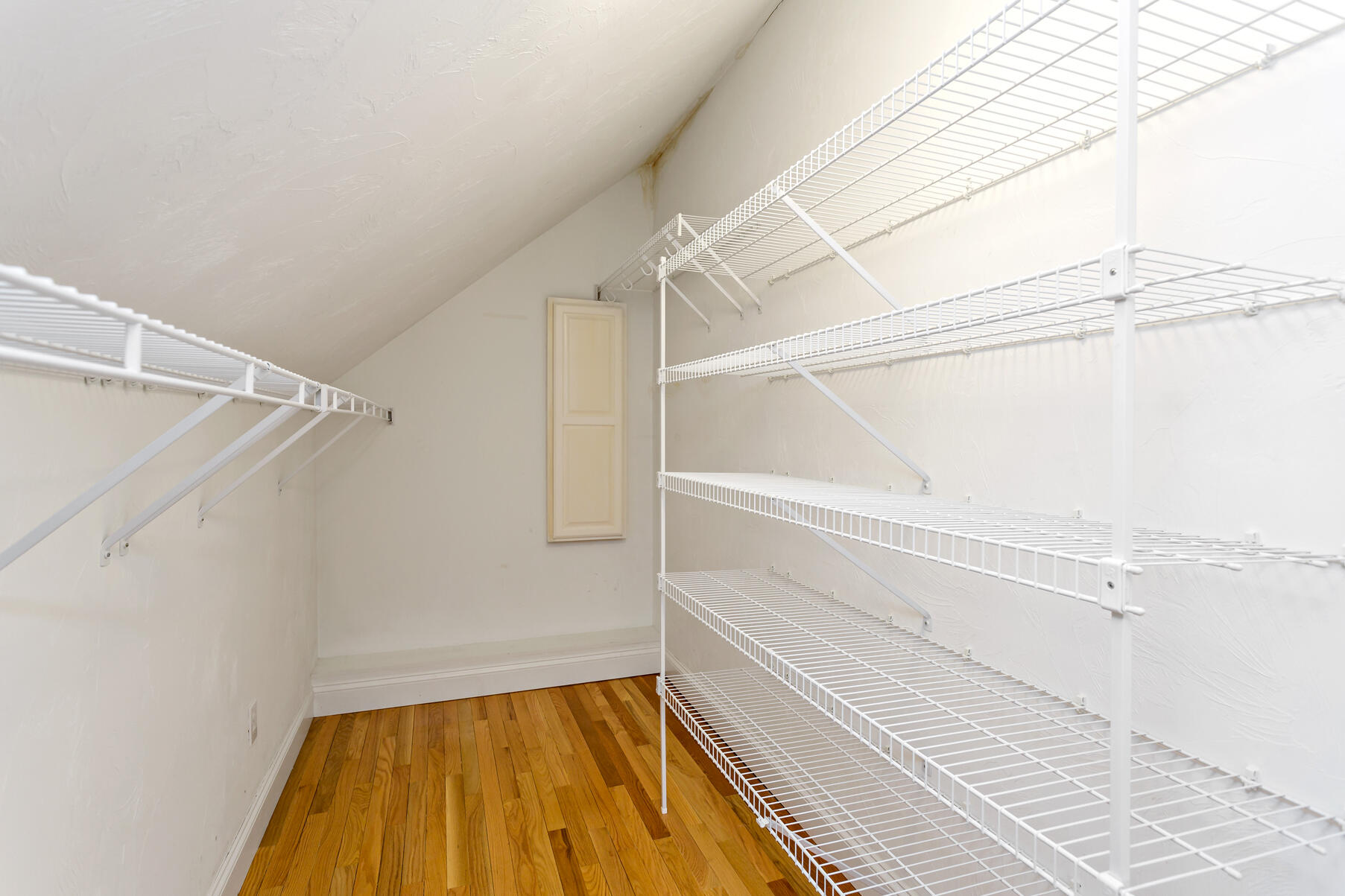 4 Gold Leaf Lane Mashpee, MA 02649 - Photo 27 of 33 a view of walk in closet with empty racks
