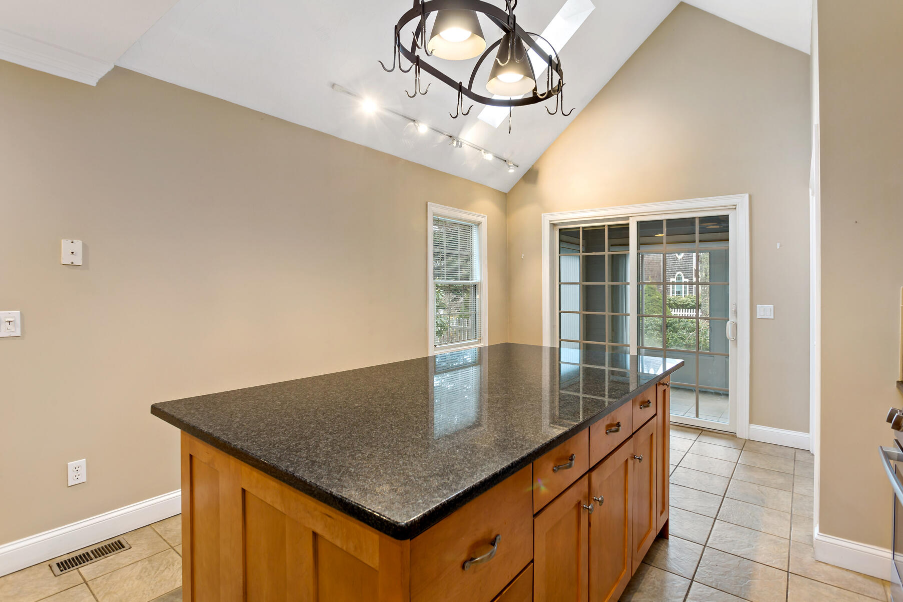 4 Gold Leaf Lane Mashpee, MA 02649 - Photo 6 of 33 a kitchen with stainless steel appliances granite countertop a sink a stove and a wooden floors
