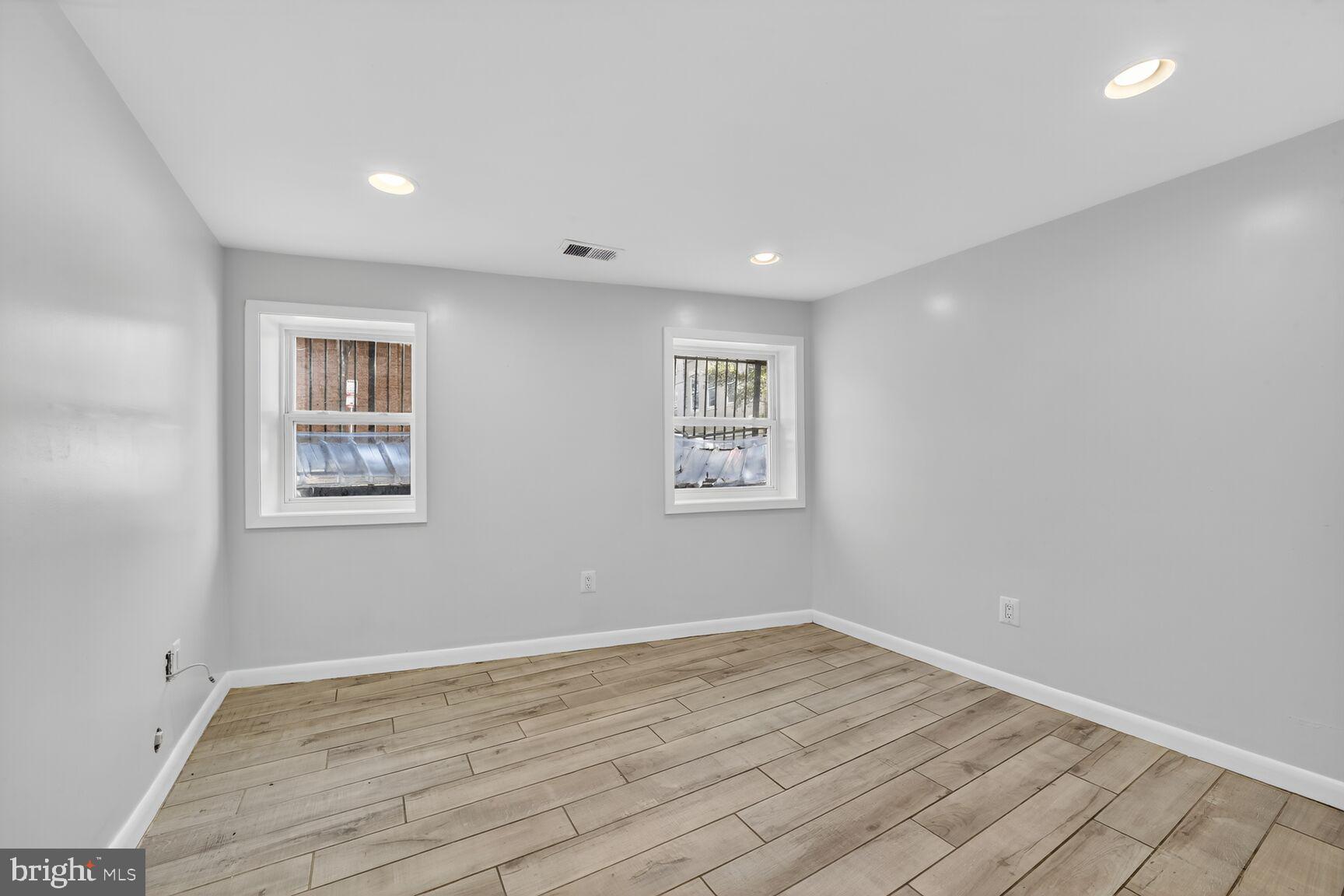 15 S Street Northeast, Unit 1 Washington, DC 20002 - Photo 8 of 12 a view of empty room with wooden floor
