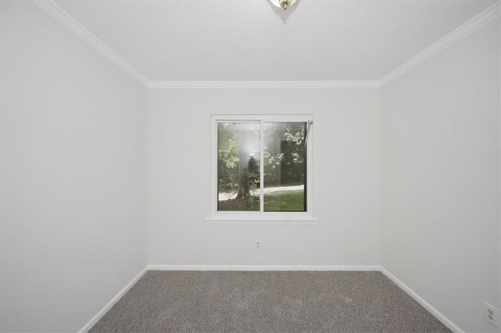 142 Deer Run Canton, GA 30114 - Photo 18 of 24 an empty room with a window