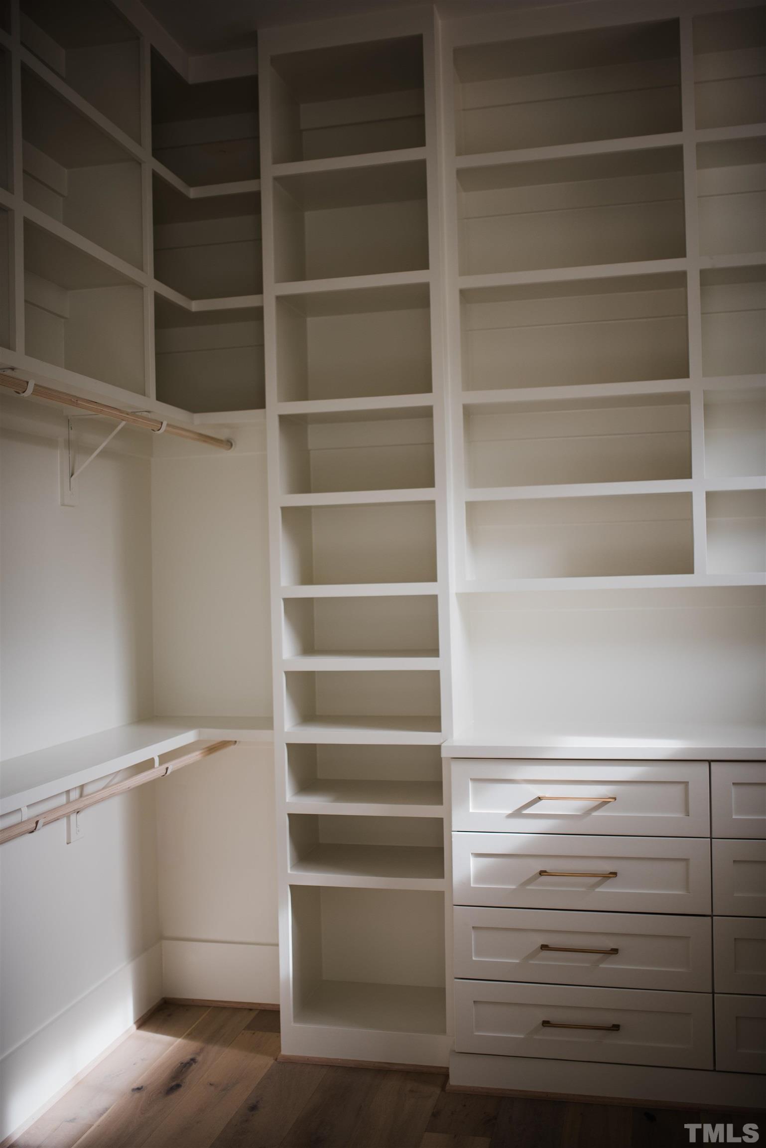 1000 Casa Dega Way Raleigh, NC 27615 - Photo 17 of 22 a view of walk in closet with empty racks