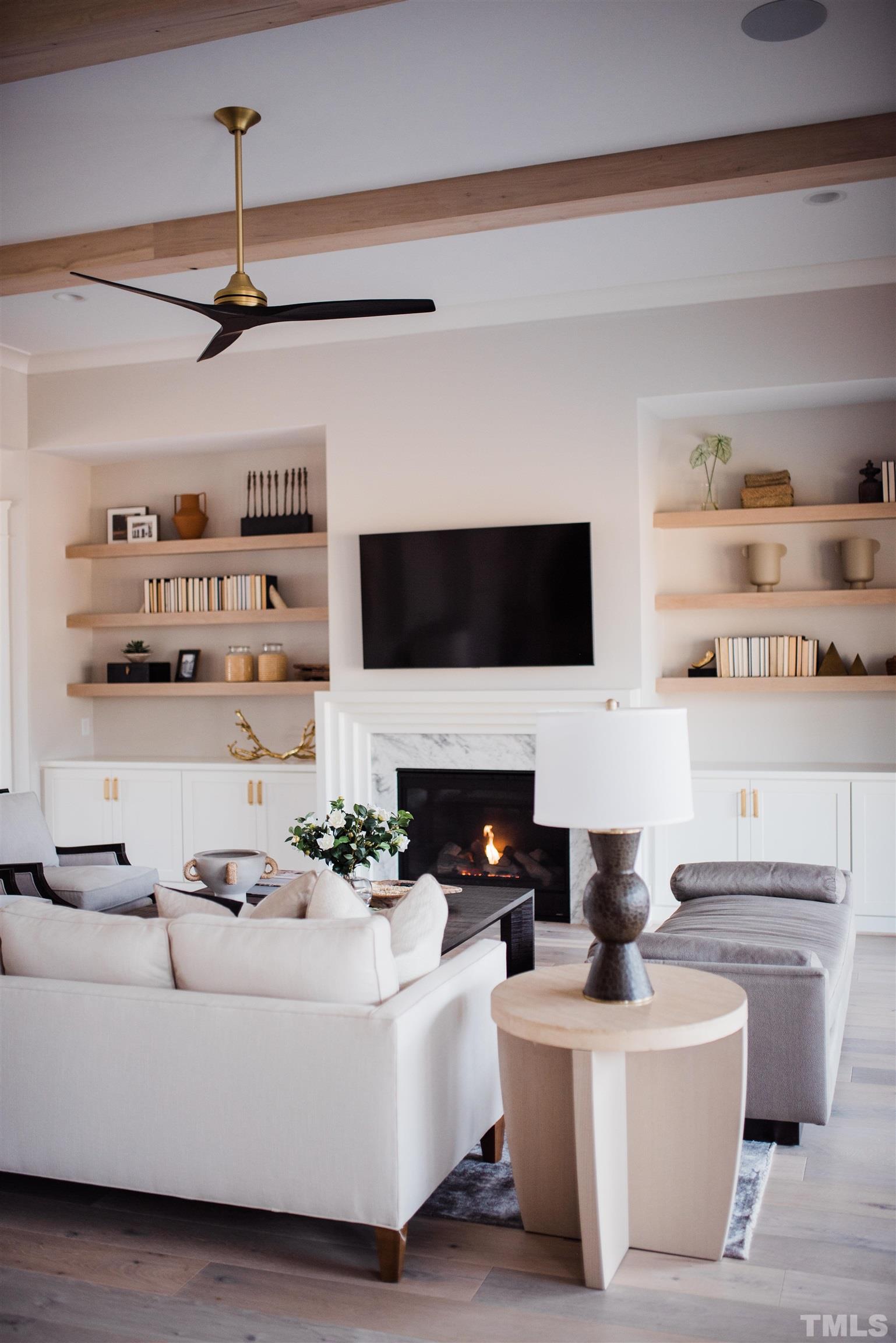 1000 Casa Dega Way Raleigh, NC 27615 - Photo 5 of 22 a living room with fireplace furniture and a flat screen tv