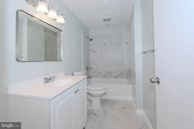 a balcony with wooden floor and fence