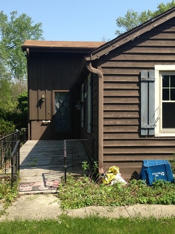 1-n063 Ridgeland Avenue West Chicago, IL 60185 - Photo 2 of 25 a front view of house with yard
