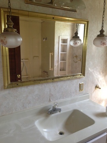 1-n063 Ridgeland Avenue West Chicago, IL 60185 - Photo 11 of 25 a bathroom with a sink and a mirror