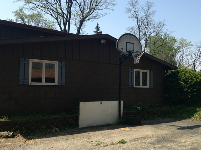 1-n063 Ridgeland Avenue West Chicago, IL 60185 - Photo 25 of 25 a view of a house with a yard