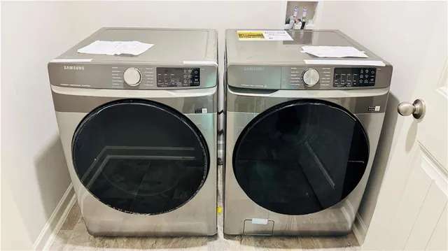 a utility room with dryer and washer