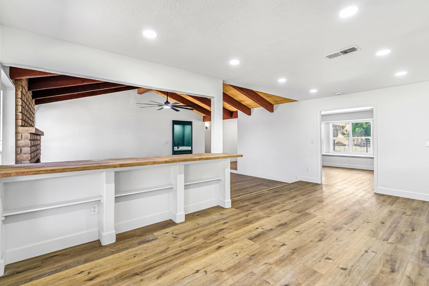 146 Sierra Avenue Clovis, CA 93612 - Photo 20 of 45 a view of storage and utility room with wooden floor