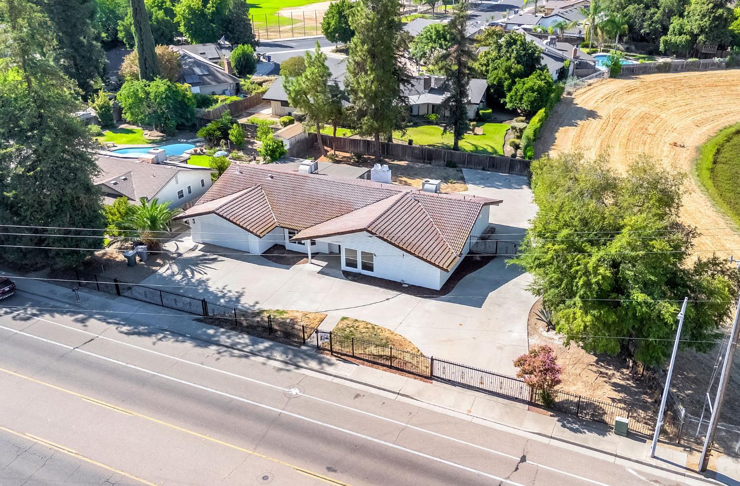 146 Sierra Avenue Clovis, CA 93612 - Photo 2 of 45 an aerial view of a house with a yard and garden