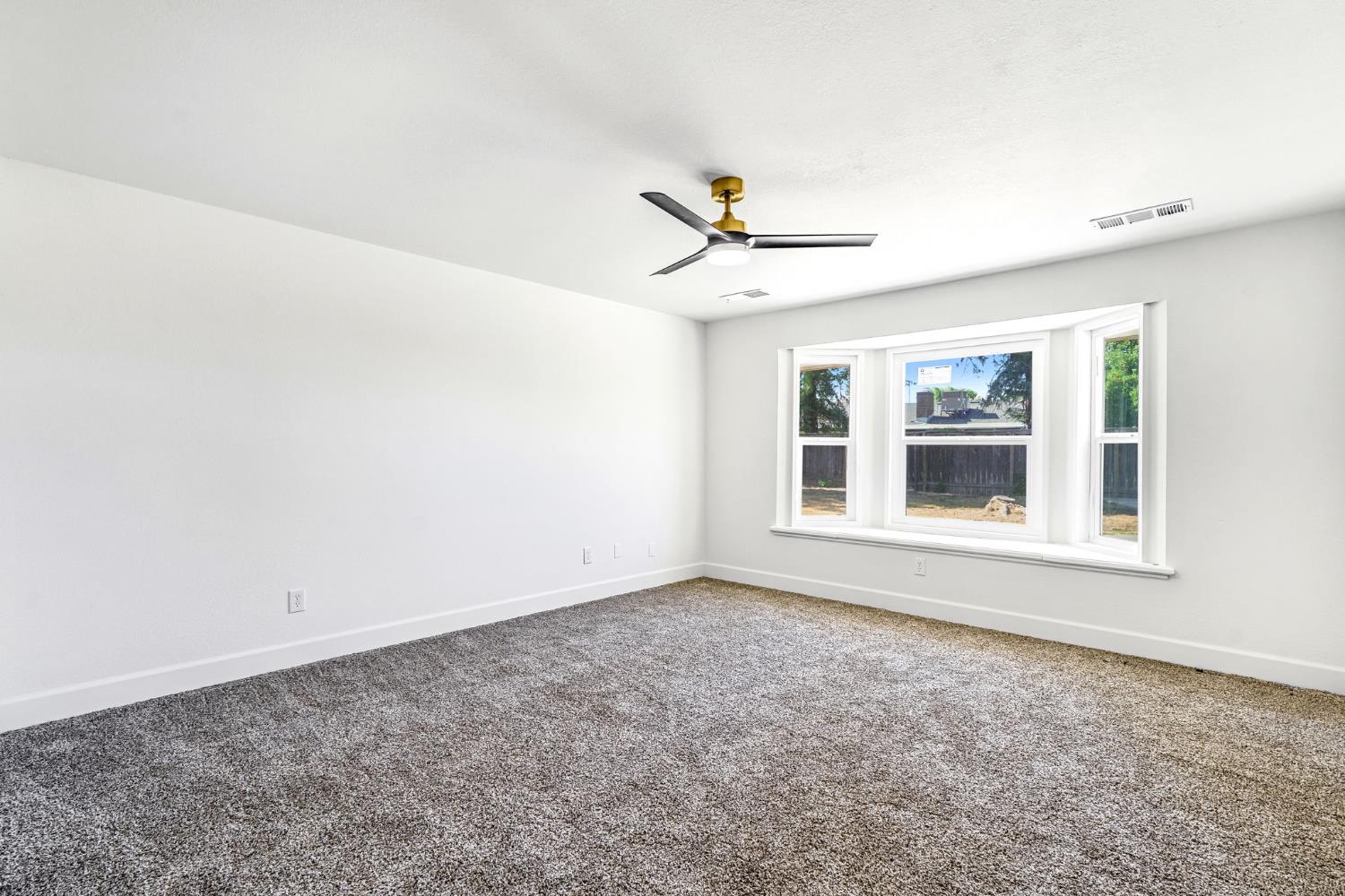 146 Sierra Avenue Clovis, CA 93612 - Photo 24 of 45 a view of an empty room with a window