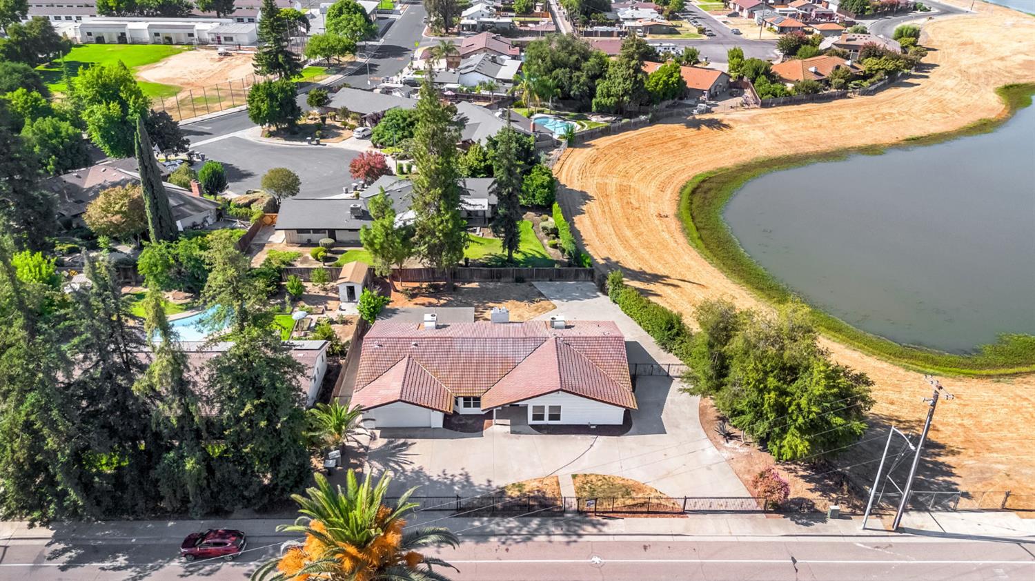 146 Sierra Avenue Clovis, CA 93612 - Photo 3 of 45 an aerial view of residential house with swimming pool