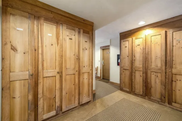 a view of a bathroom with shower and a bathroom