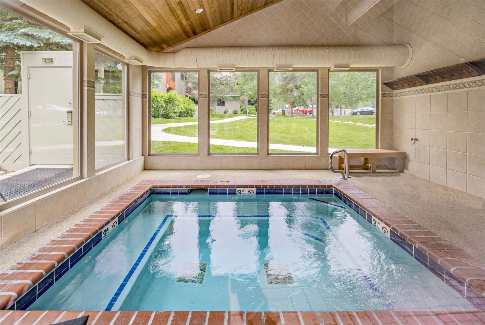 1977 Soda Ridge Road, Unit 1194 Keystone, CO 80435 - Photo 8 of 44 a view of a bathtub in a room next to a large window