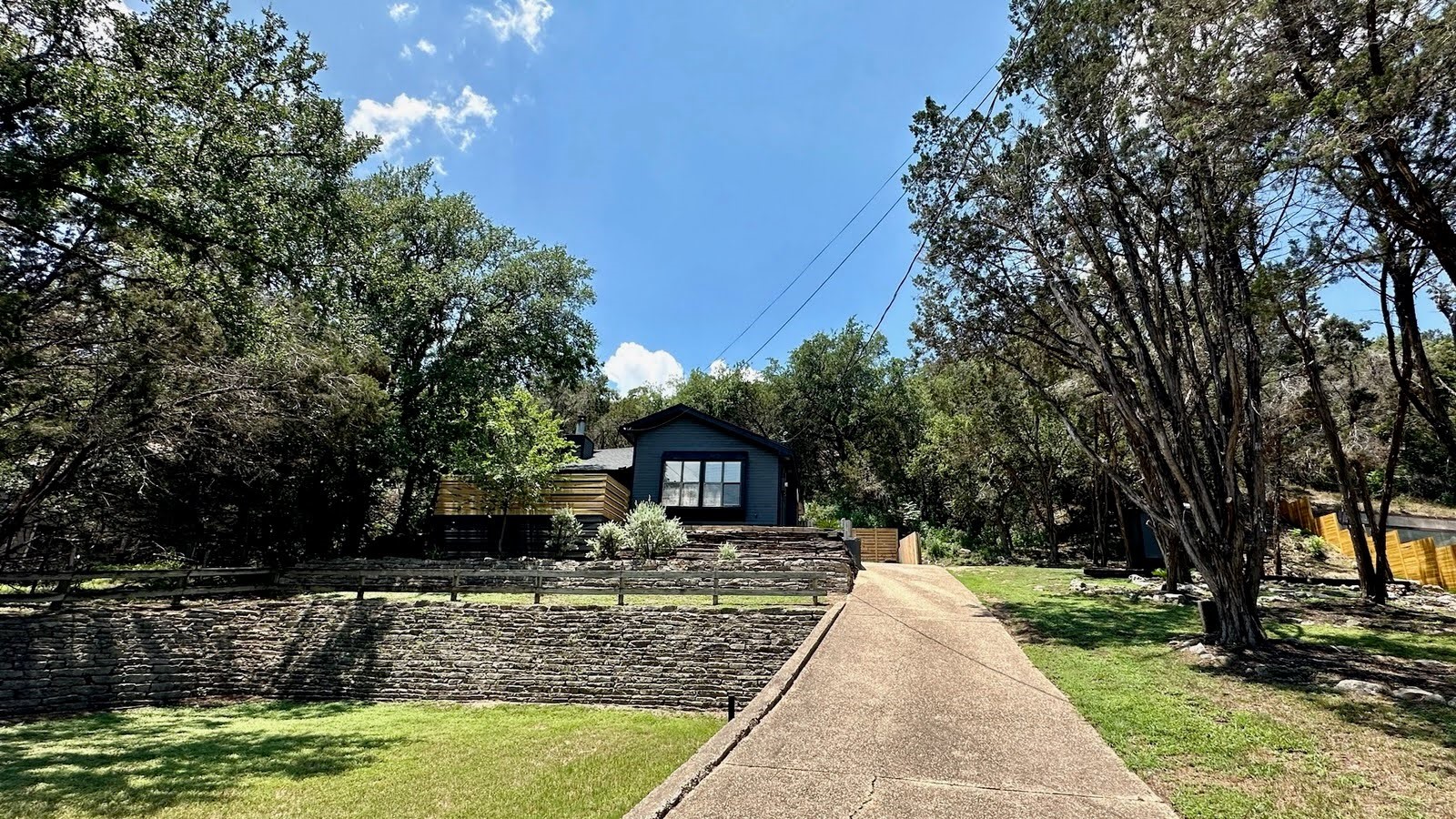 2712 Geronimo Trail Austin, TX 78734 - Photo 1 of 31 a front view of a house with a yard