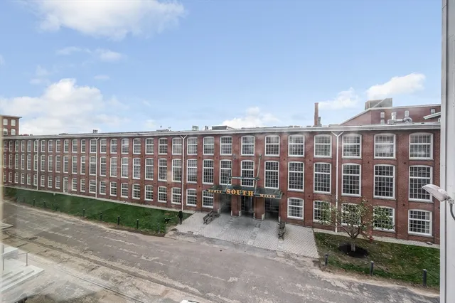 a view of a building with a garden