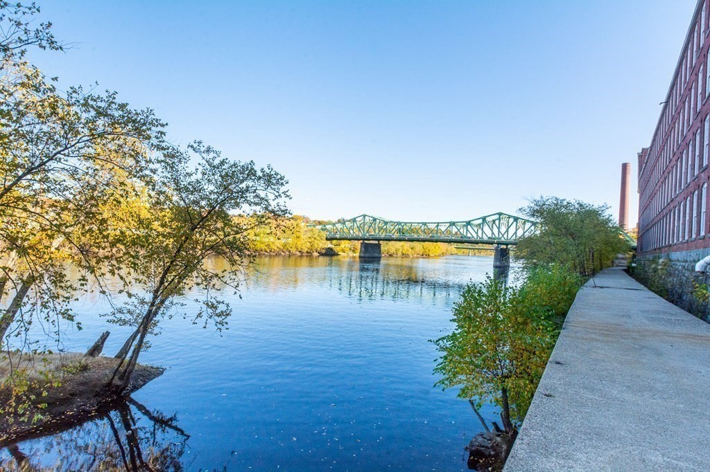 130 John Street, Unit 355 Lowell, MA 01852 - Photo 28 of 34 a view of a lake with a outdoor space