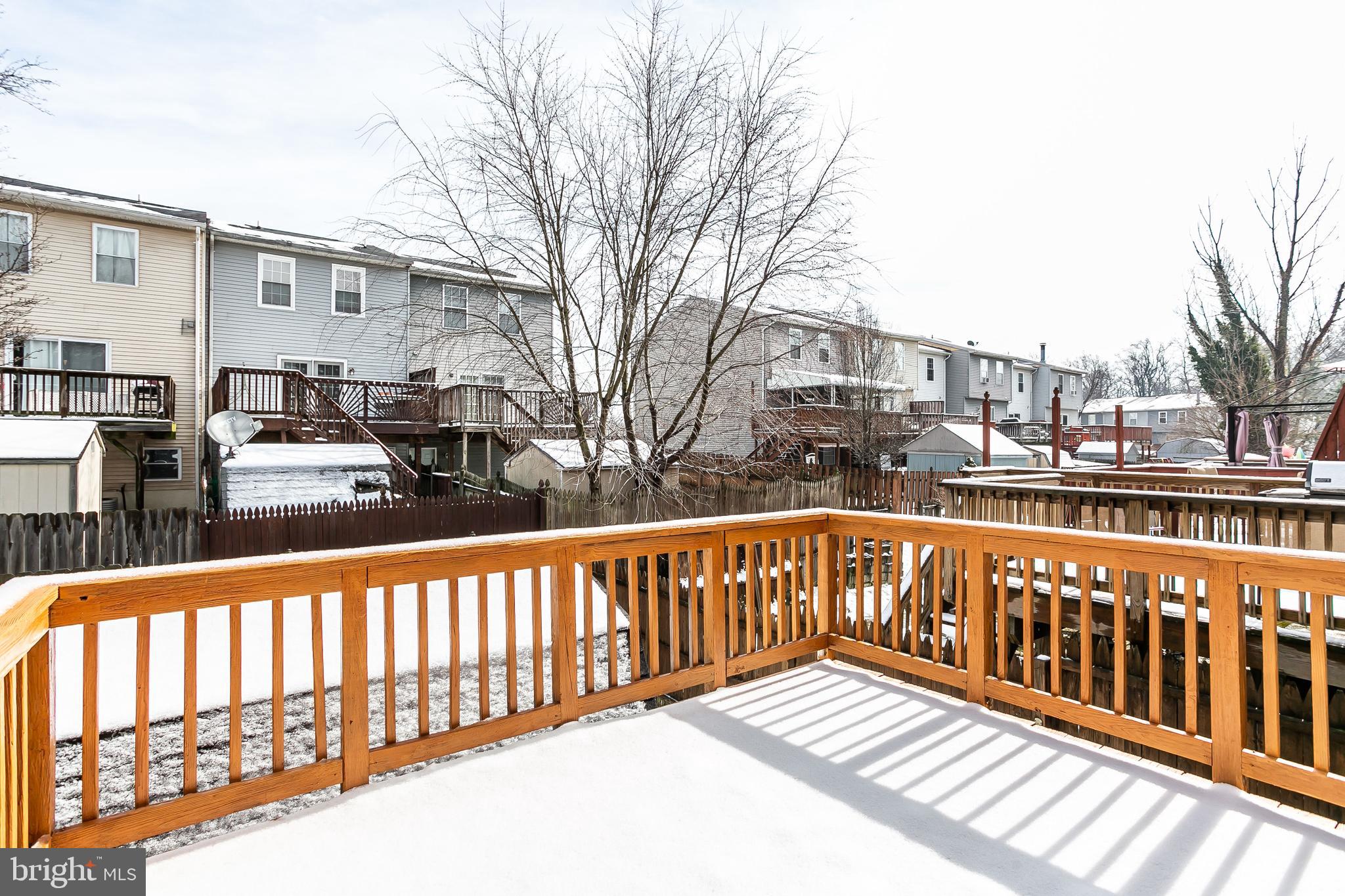 615 Nollmeyer Road Baltimore, MD 21220 - Photo 15 of 46 a view of a street with wooden fence