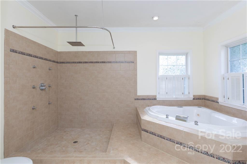 323 Ferguson Ridge Road Clover, SC 29710 - Photo 24 of 47 a bathroom with a bath tub and a shower