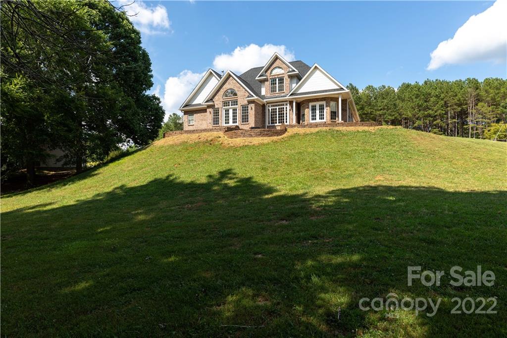 323 Ferguson Ridge Road Clover, SC 29710 - Photo 3 of 47 a view of a house with a big yard