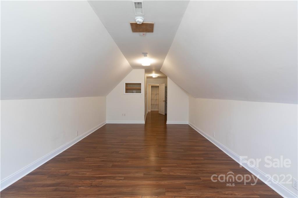 323 Ferguson Ridge Road Clover, SC 29710 - Photo 33 of 47 a view of a hallway with wooden floor and a large window
