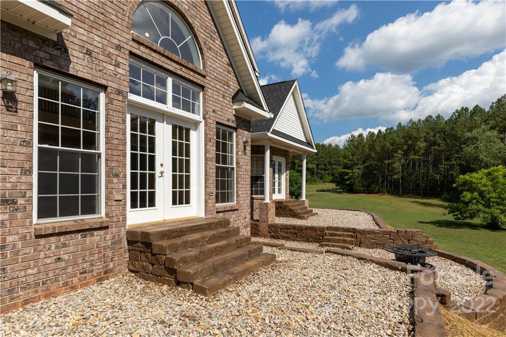 323 Ferguson Ridge Road Clover, SC 29710 - Photo 34 of 47 a front view of a house with a yard