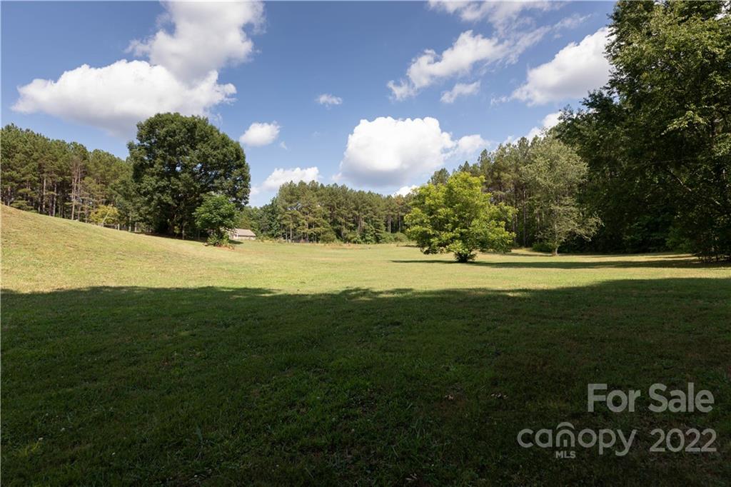 323 Ferguson Ridge Road Clover, SC 29710 - Photo 39 of 47 a view of a golf course with a garden