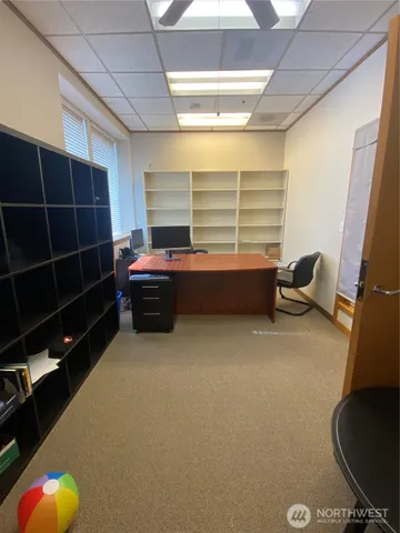 a room with furniture and window